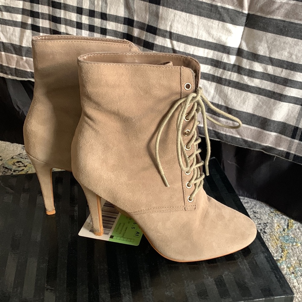 Victorias Secret taupe suede lace up boots in size 6.5 in box.